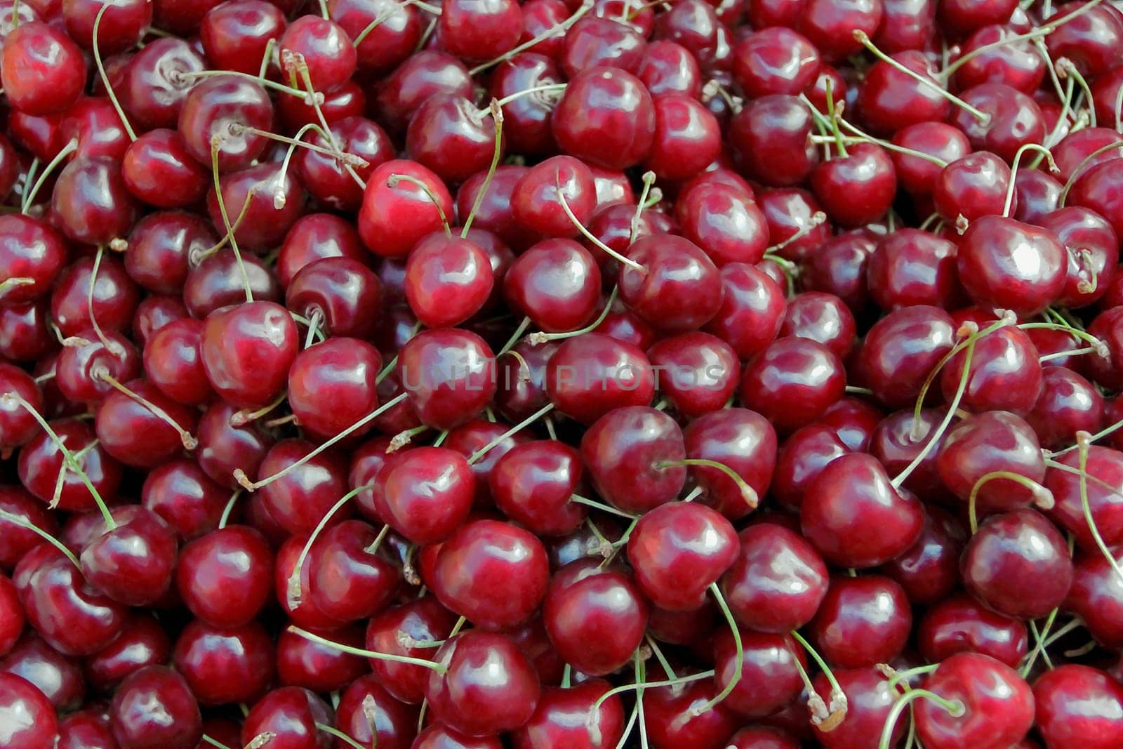 Image of background fresh dark red cherry