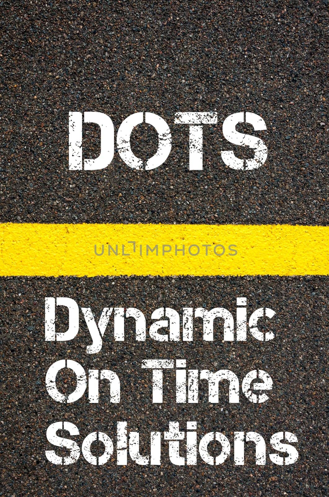 Concept image of Business Acronym DOTS Dynamic On Time Solutions written over road marking yellow paint line
