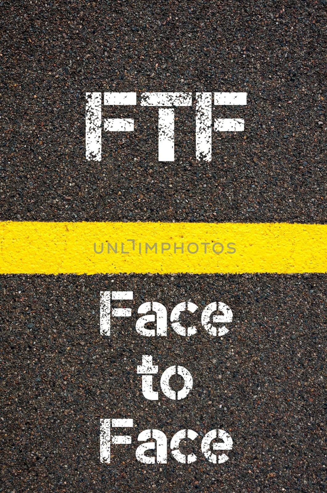 Concept image of Business Acronym FTF Face To Face written over road marking yellow paint line