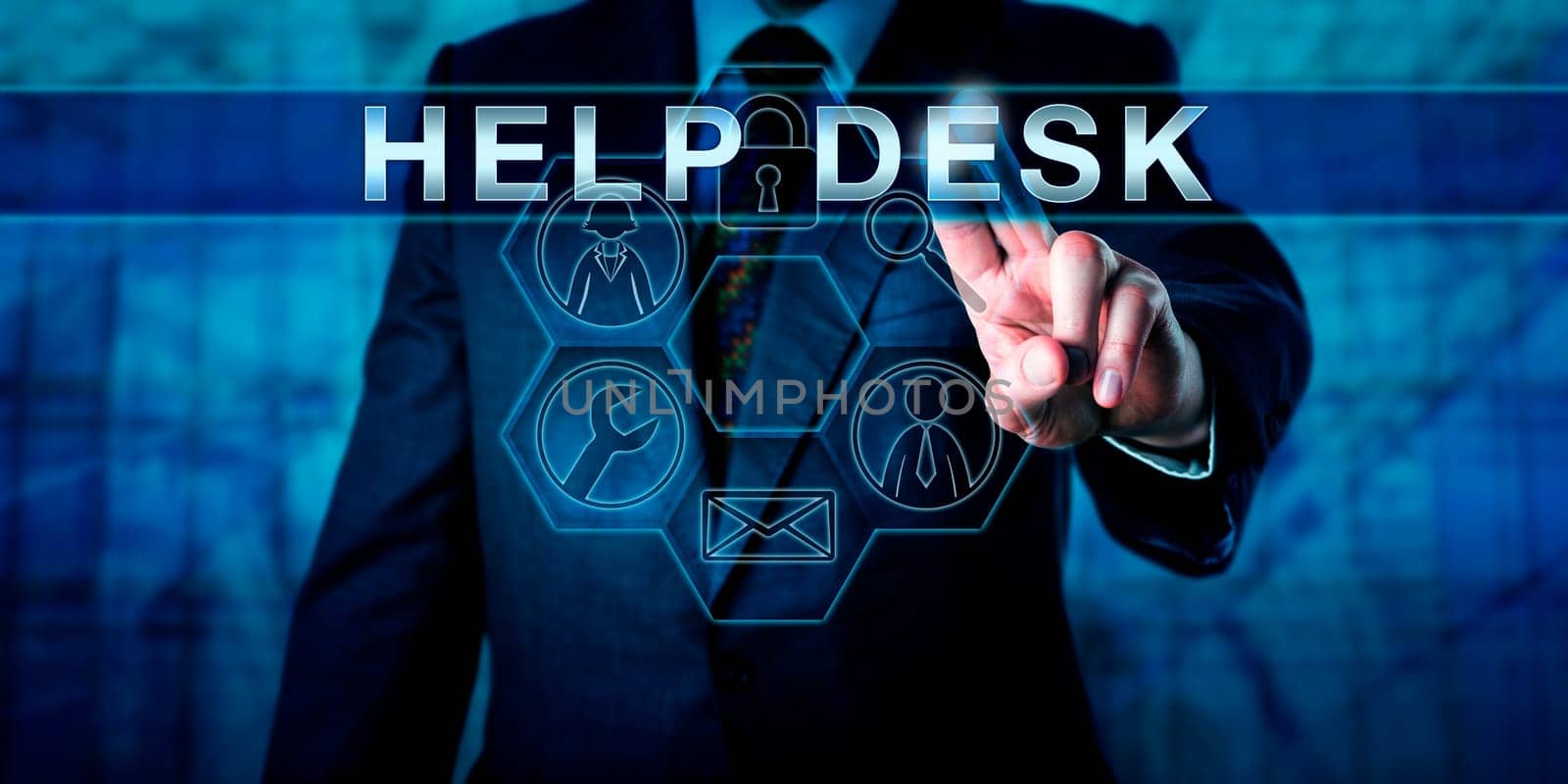 Business person is pressing HELP DESK on a virtual interactive touch screen interface. Business metaphor and information technology concept. Service icons do light up in a hexagonal control matrix.