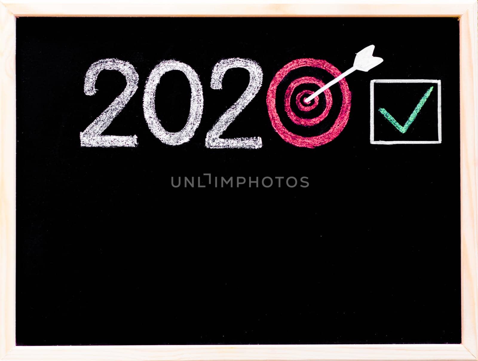 Conceptual image of Year 2020, with number zero in shape of a target, arrow in the center and checked sign