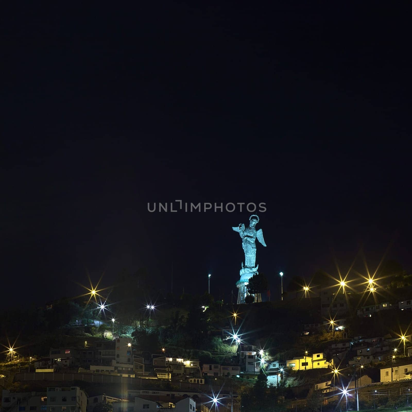 QUITO, ECUADOR - AUGUST 8, 2014: La Virgen de El Panecillo statue in the city center photographed at night on August 8, 2014 in Quito, Ecuador. Quito is an UNESCO World Cultural Heritage Site.