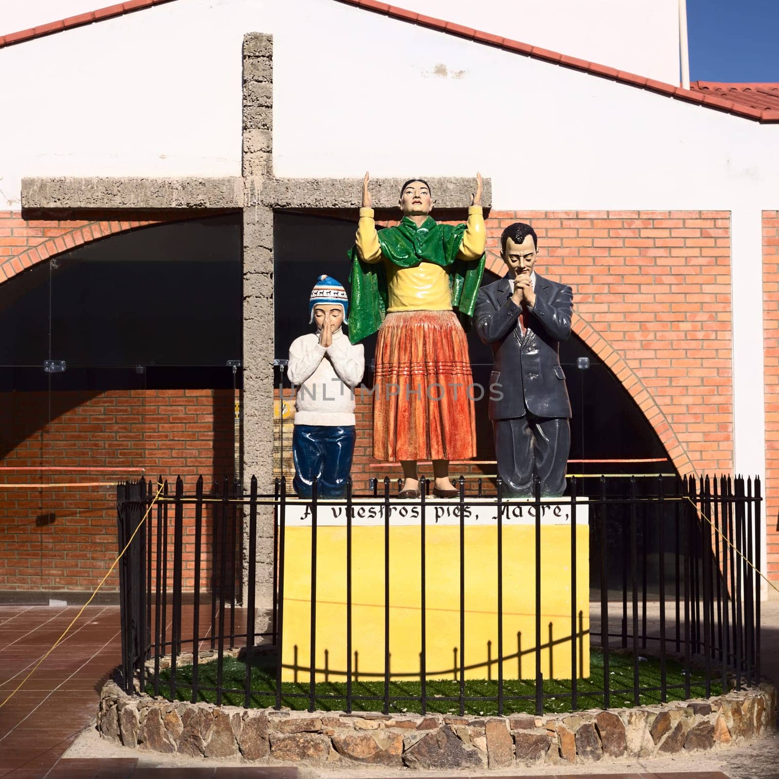 COPACABANA, BOLIVIA - OCTOBER 19, 2014: Statues and cross outside the Velatorio (Chapel of Rest) in the small tourist town along Lake Titicaca on October 19, 2014 in Copacabana, Bolivia