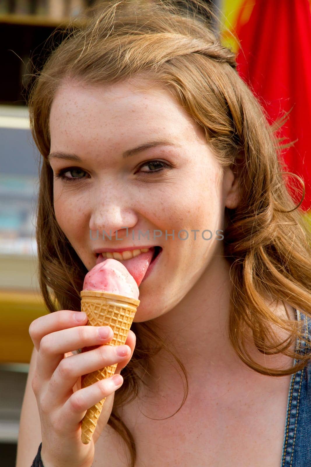 Young woman eating ice cream