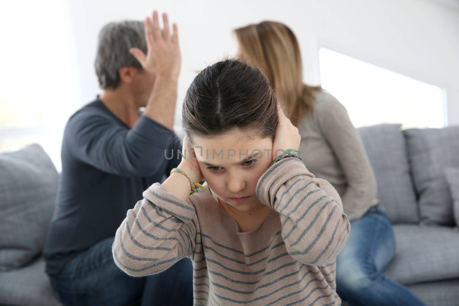 Parents fighting and daughter being upset