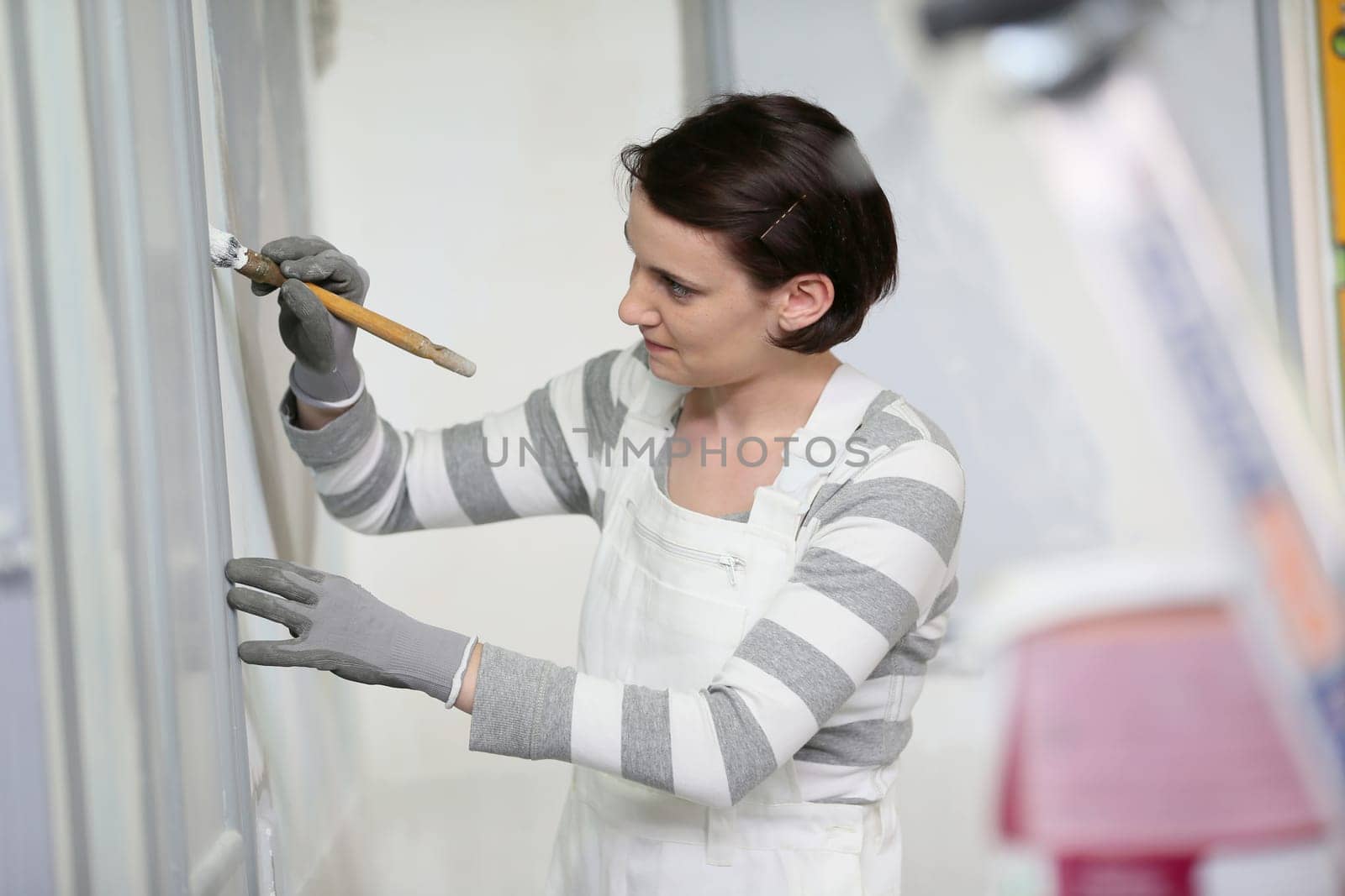 Young woman in professional school to become painter