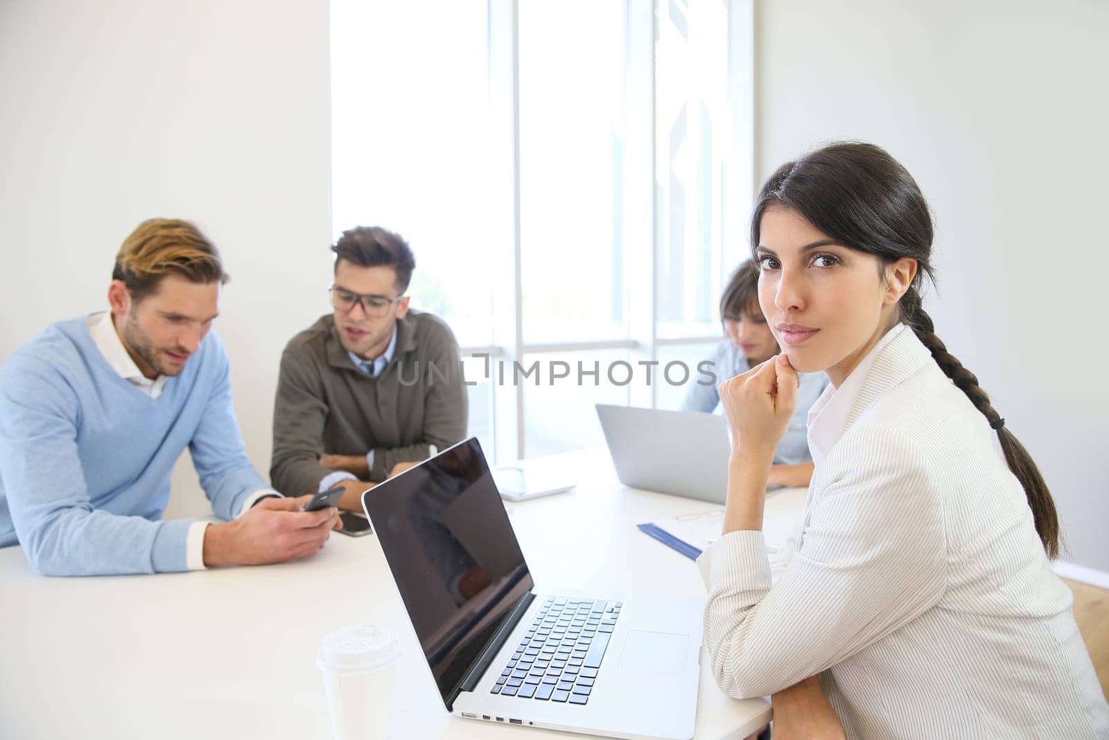 Start-up businesspeople sharing working space