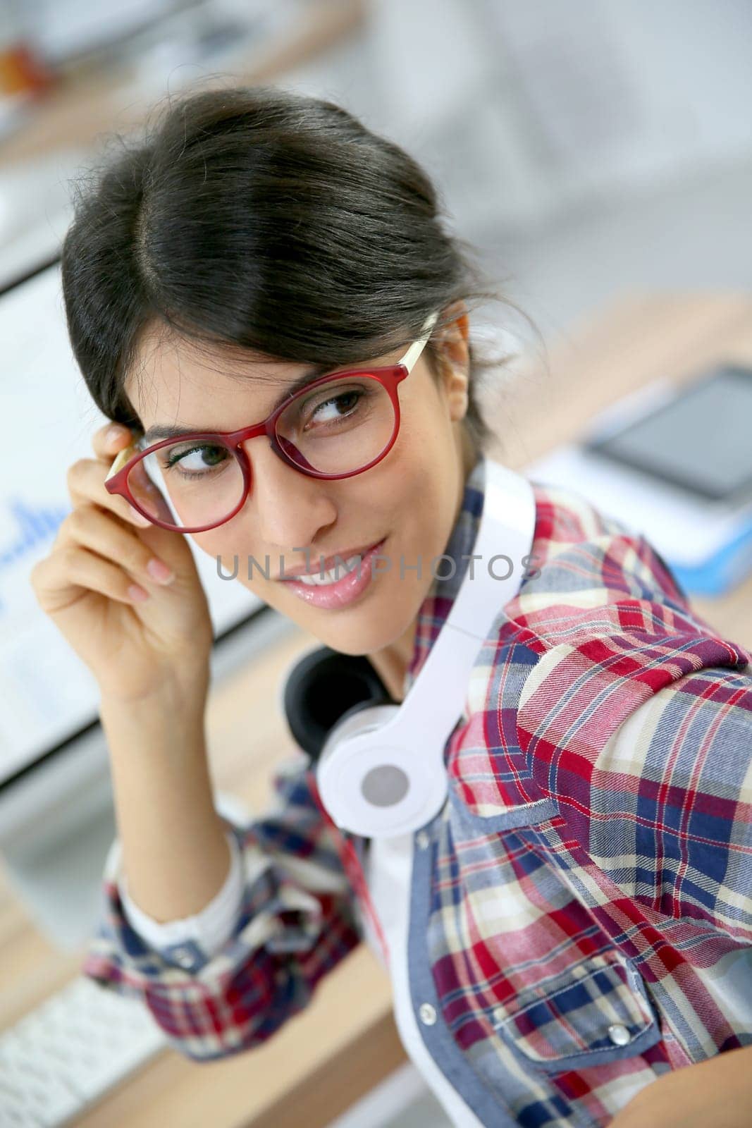 Portrait of office worker with eyeglasses on