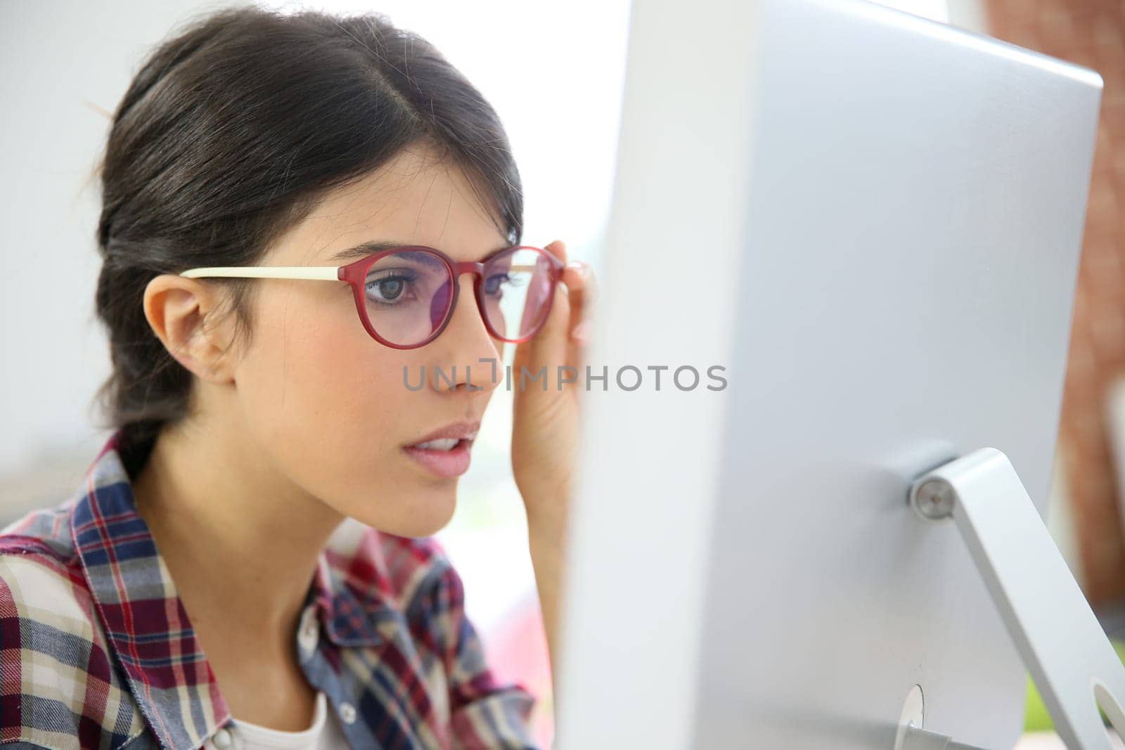 Portrait of office worker with eyeglasses on