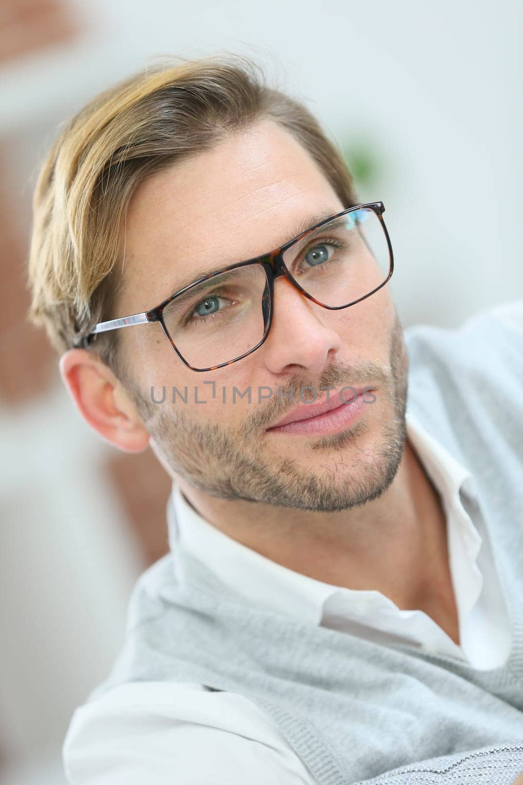 Portrait of handsome man with eyeglasses on