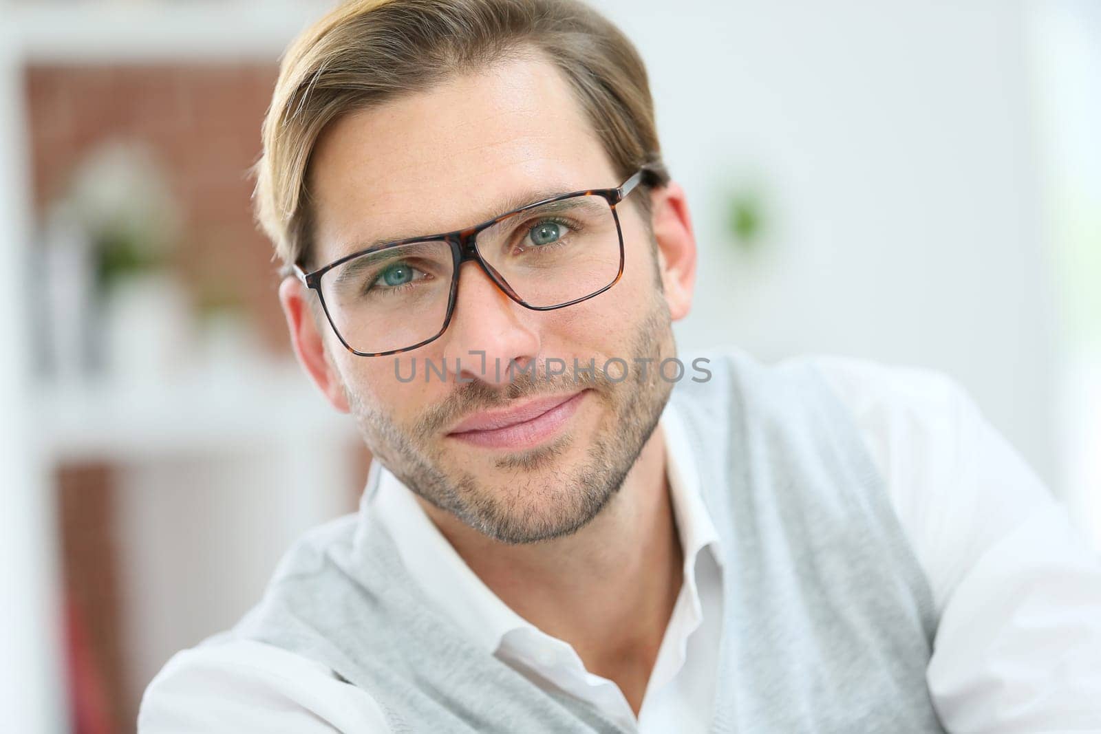Portrait of handsome man with eyeglasses on