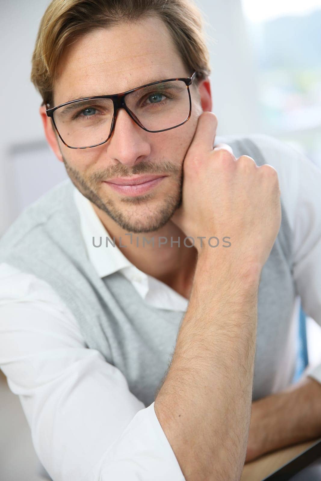 Portrait of handsome man with eyeglasses on
