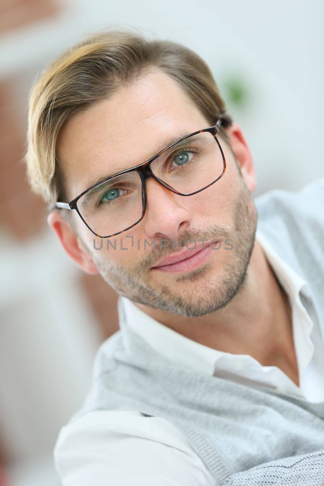 Portrait of handsome man with eyeglasses on