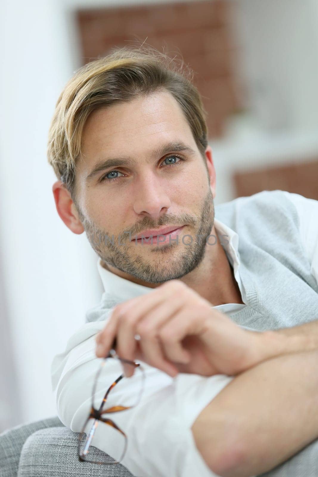 Portrait of handsome man with eyeglasses on