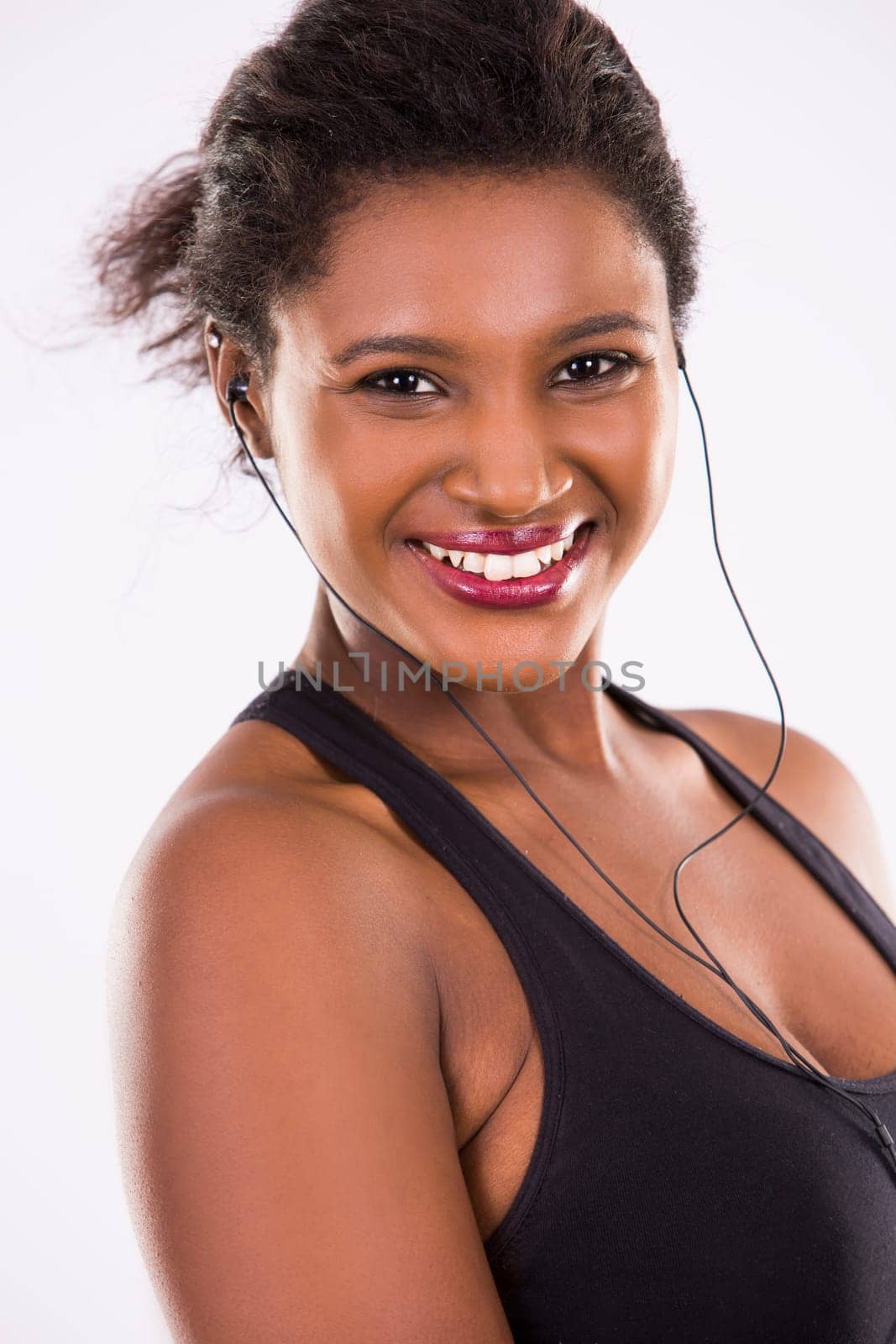 young black woman wearing fitness outfit on white isolated background
