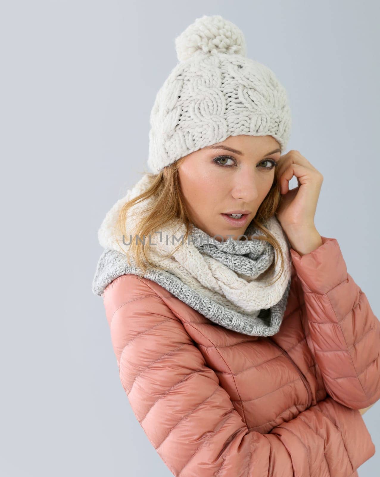 Woman model with winter outfit, isolated