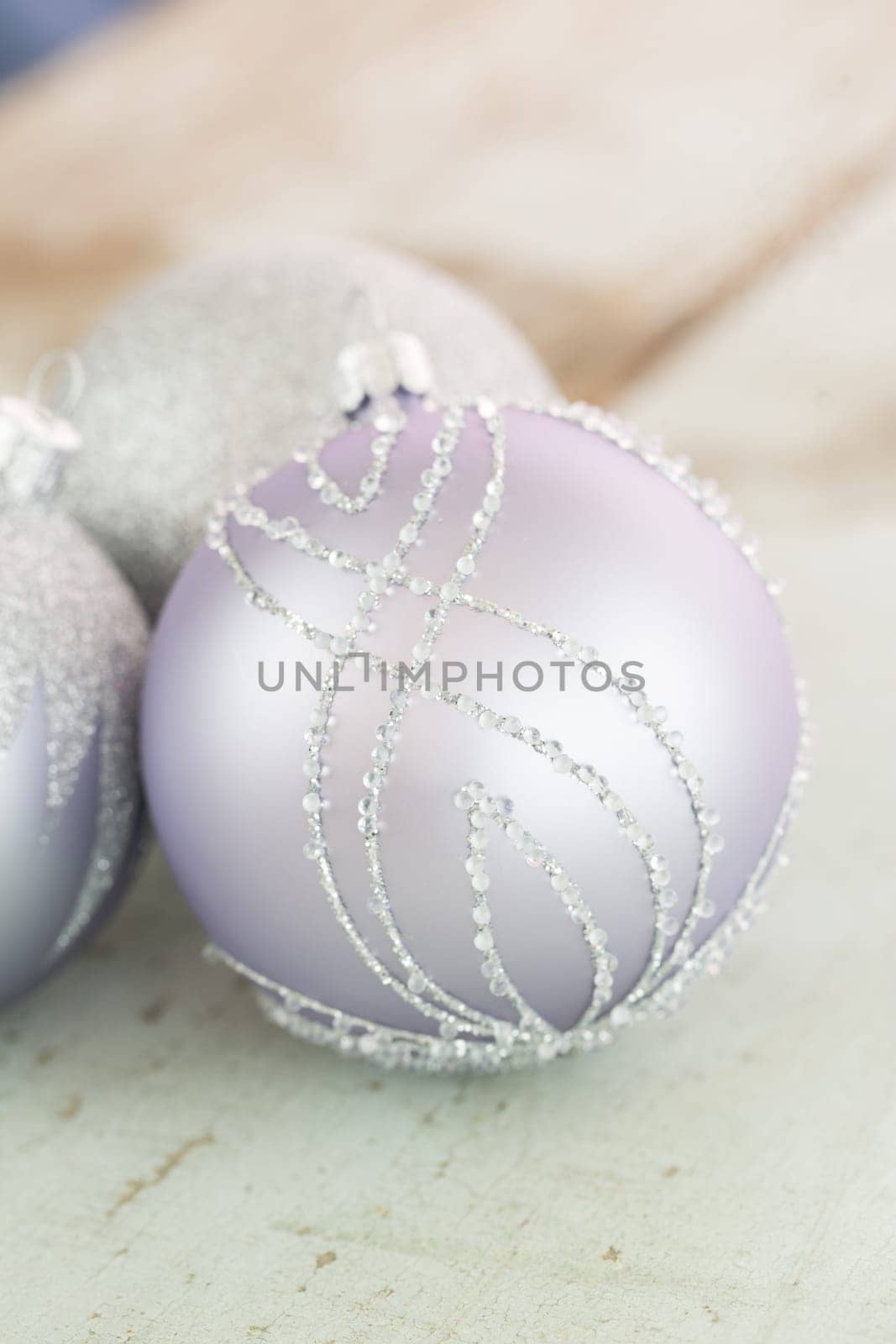 Decorated Silver Christmas Balls with focus in the foreground Christmas to celebrate the festive holiday season