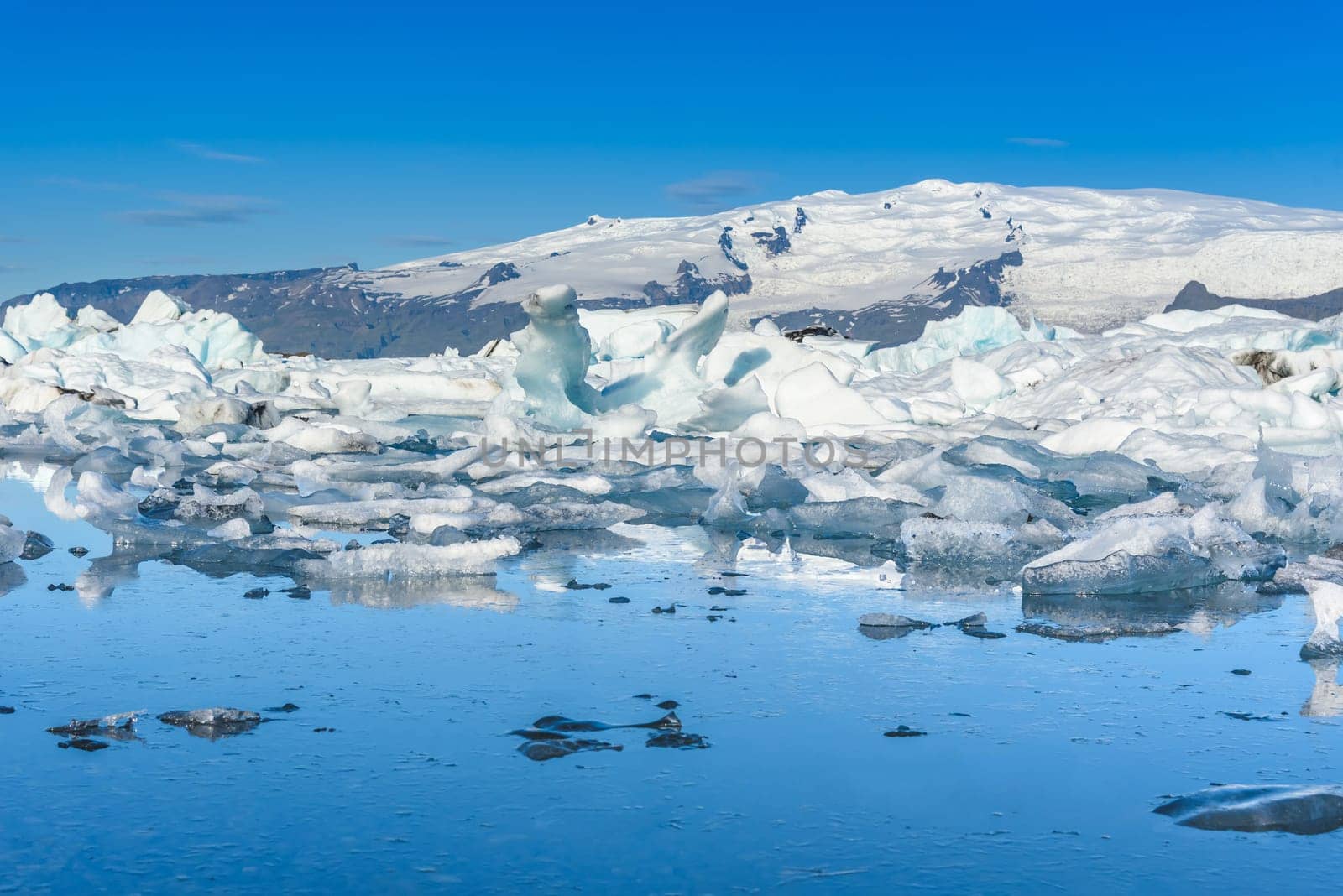 Beautiful view of icebergs in Jokulsarlon glacier lagoon, Iceland, selective focus, global warming and climate change concept