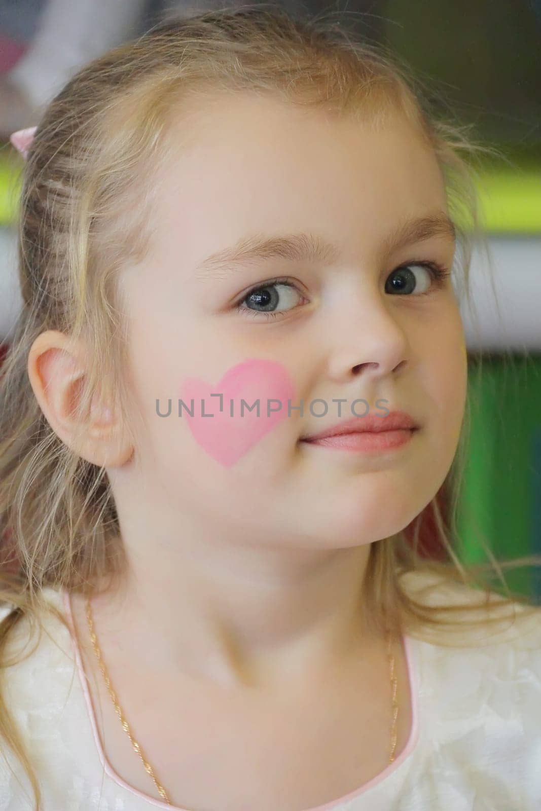 Portrait of beautiful girl with blue eyes
