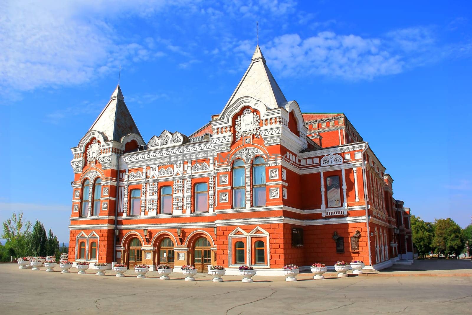 Town landscape with historic theater and blue sky