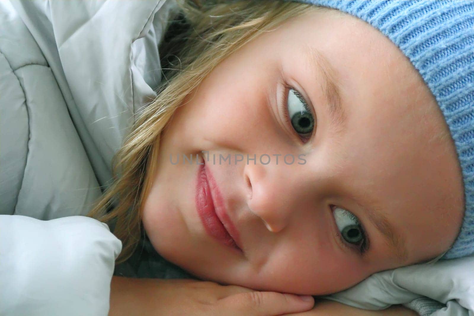 Portrait of beautiful girl with blue eyes