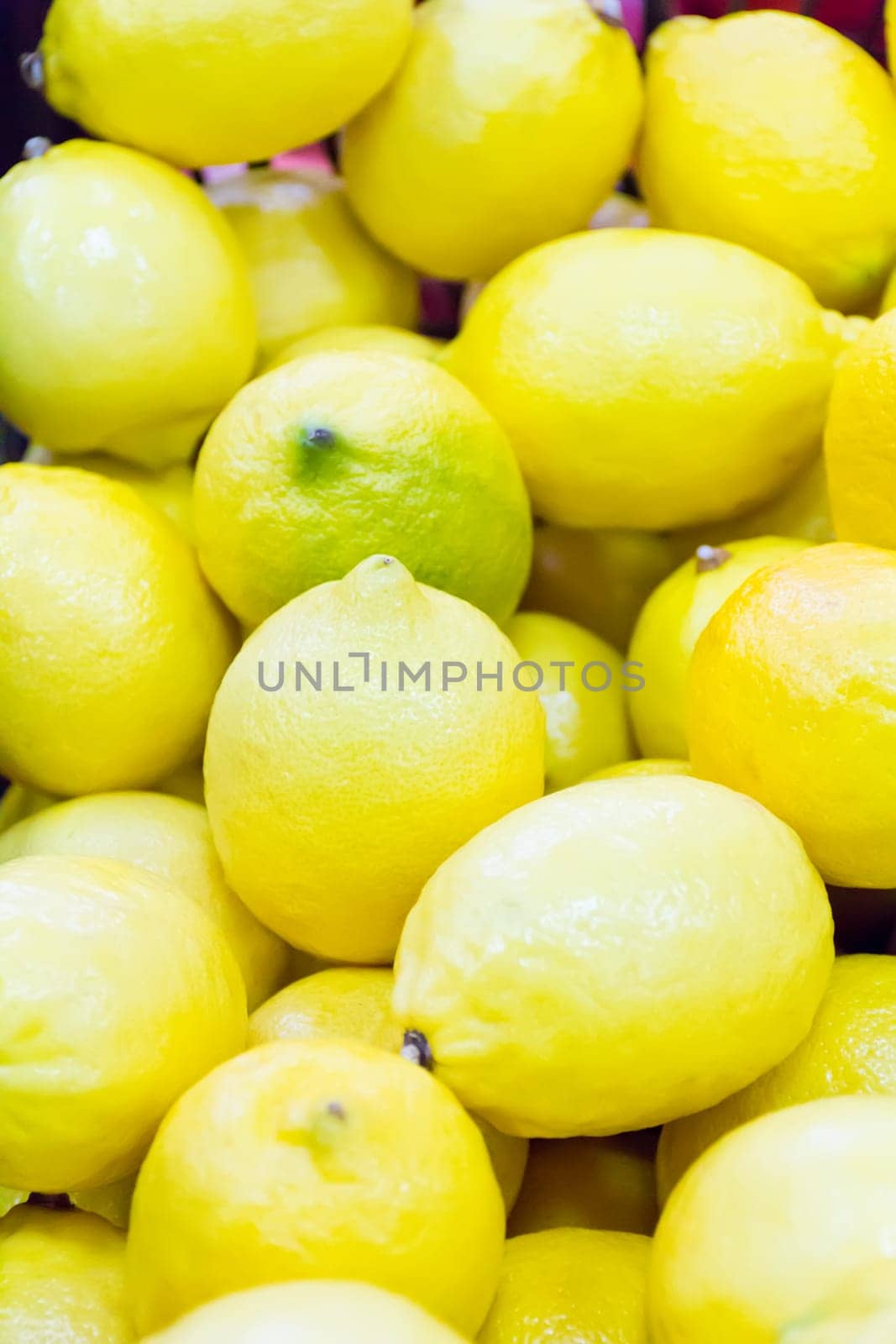 Photo of background with yellow ripe lemon