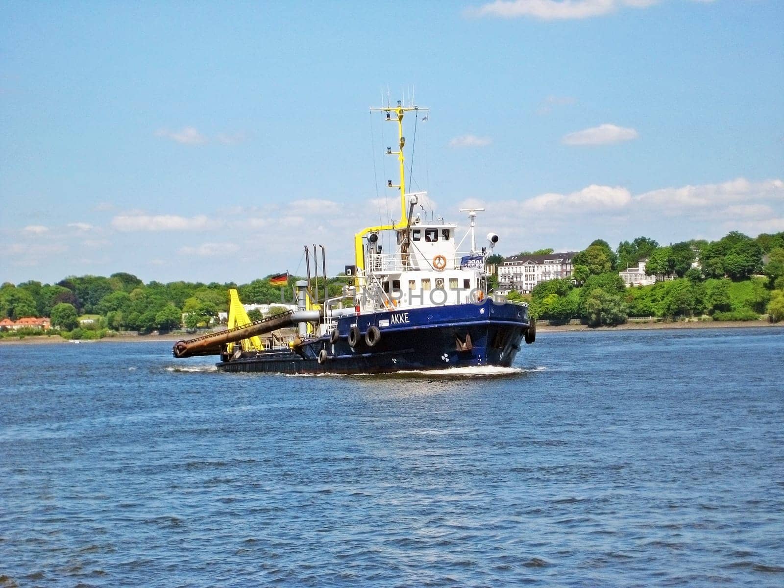 Hamburg, Germany - May 24, 2008: Construction vessel "Akke"" on the river Elbe. It eliminates slick and sediments in the docks."