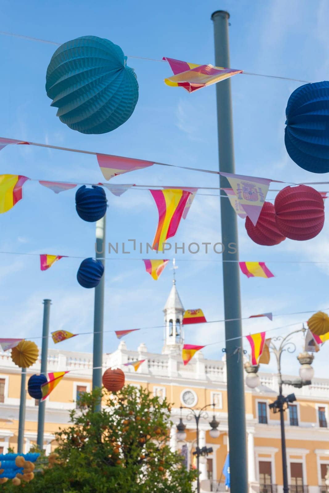 Badajoz Town Hall building between paper lanterns during San Juan Festivities Fair