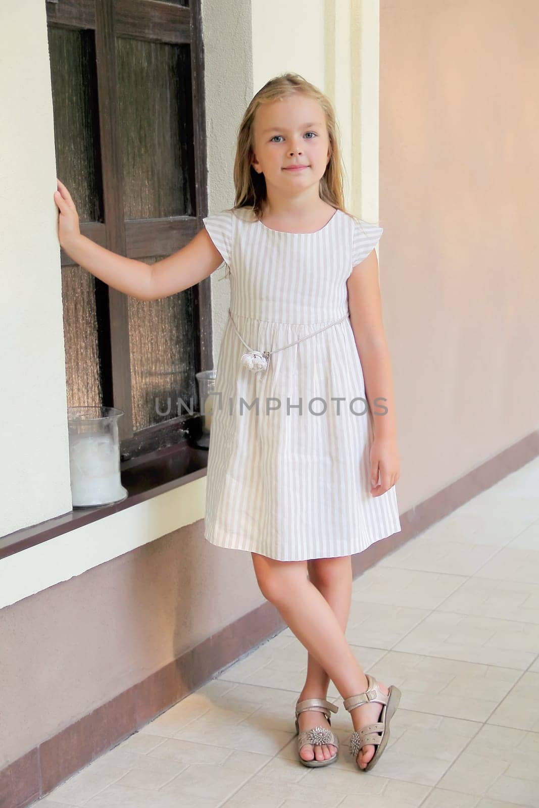 Portrait of beautiful girl with blue eyes