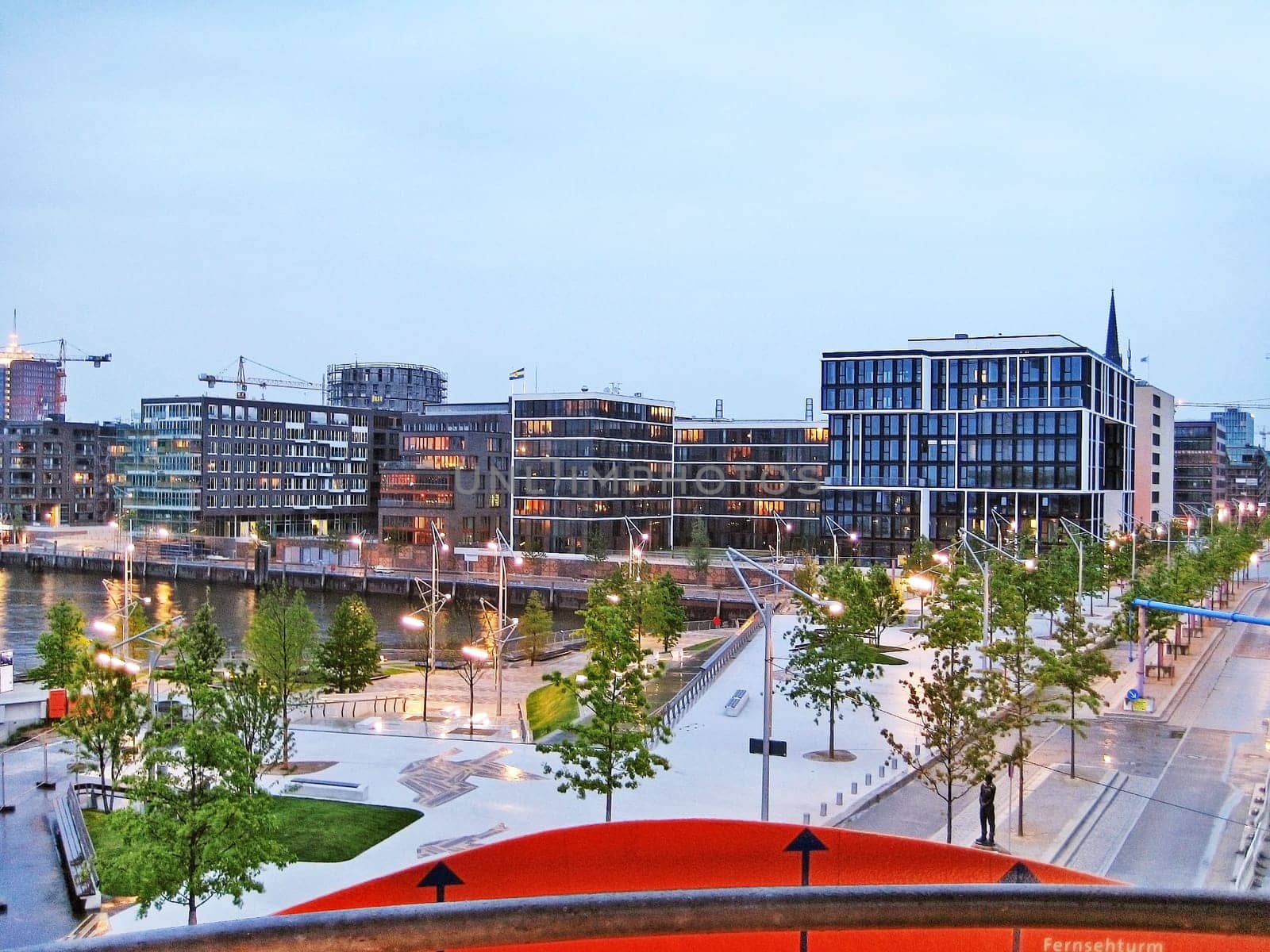 Hamburg, Germany - May 25, 2008: Hamburg Hafencity. Channel in foreground surrounded by modern buildings. View from tower.