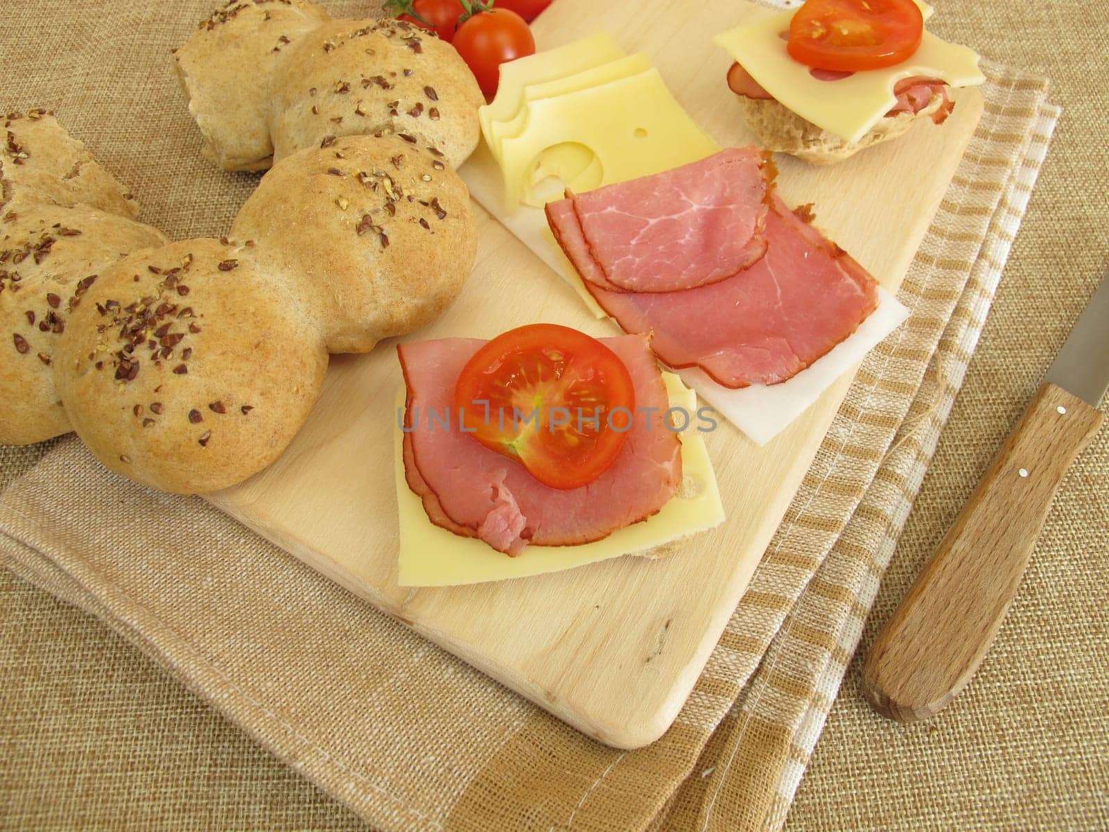Snack with roll wreath,cheese and tomato sandwich