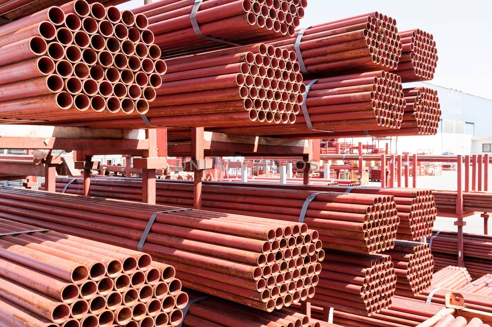 Steel Pipes bunch on the rack in warehouse
