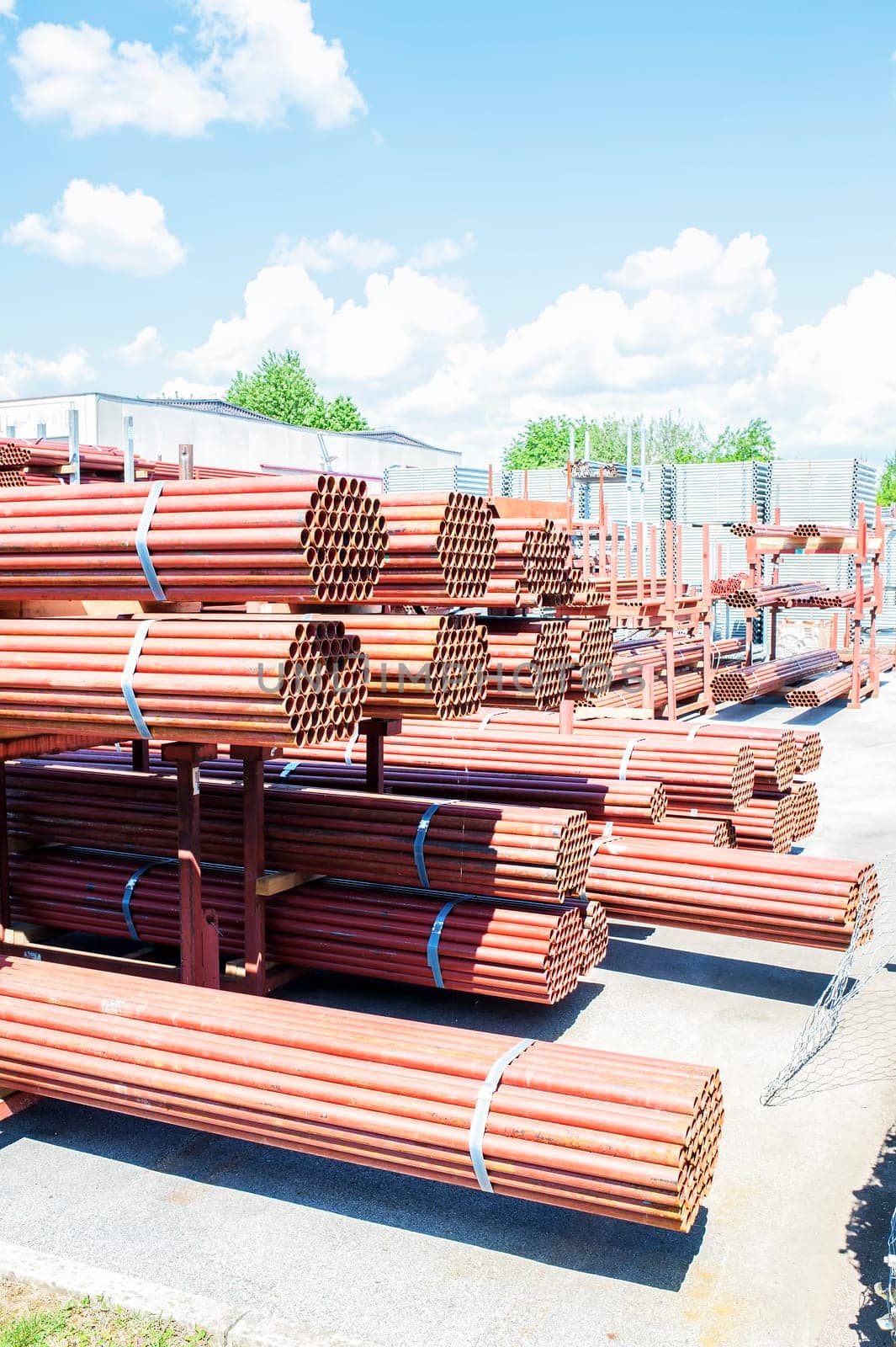 Steel Pipes bunch on the rack in warehouse