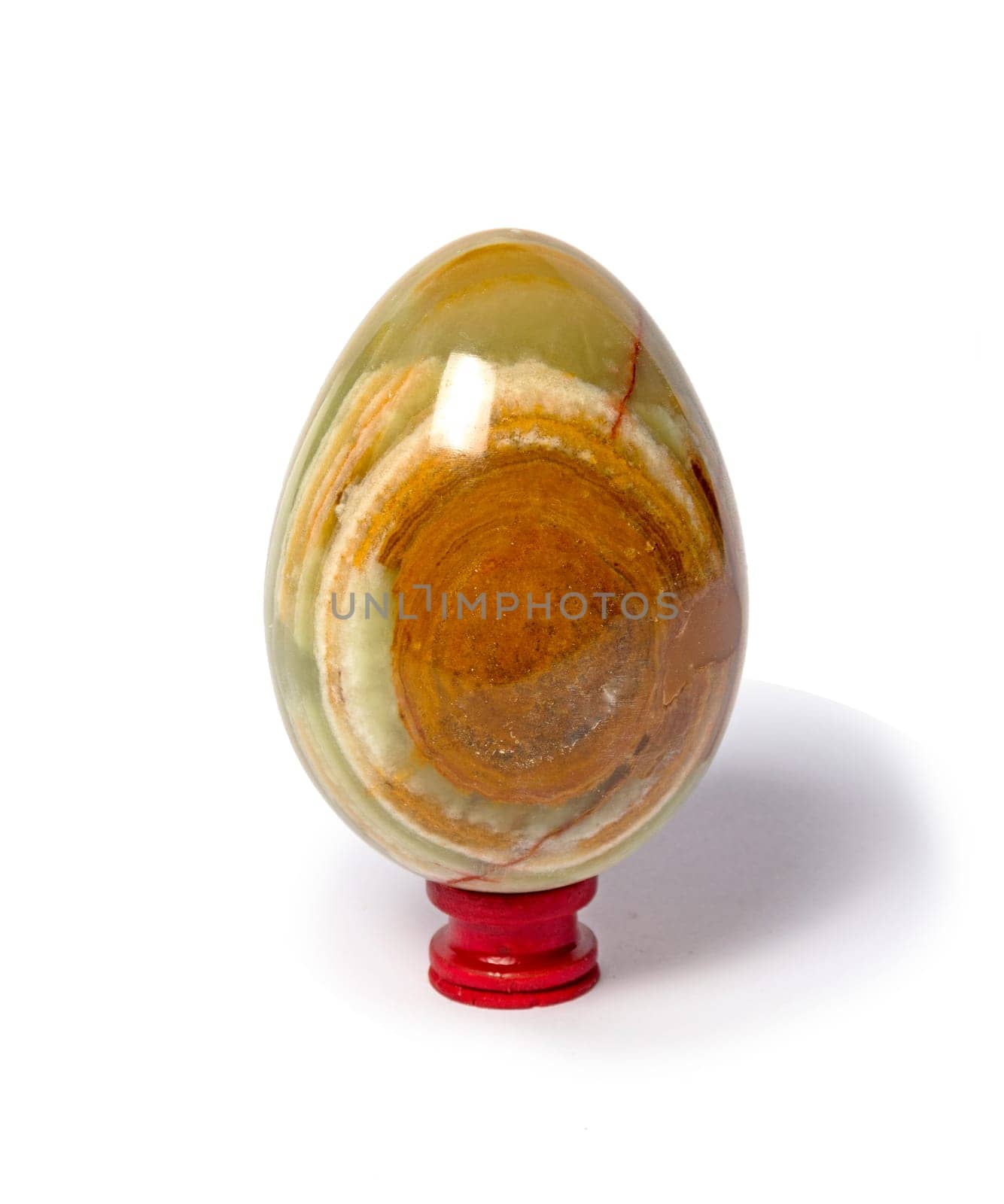 Onyx stone egg isolated on white background