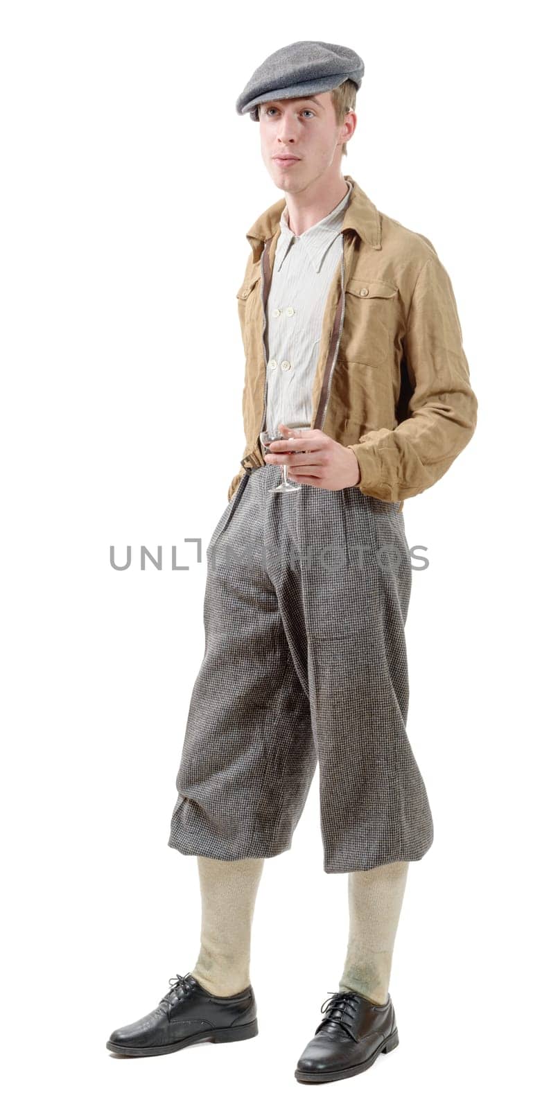 Young man with clothes and cap in 40s style isolated on white background