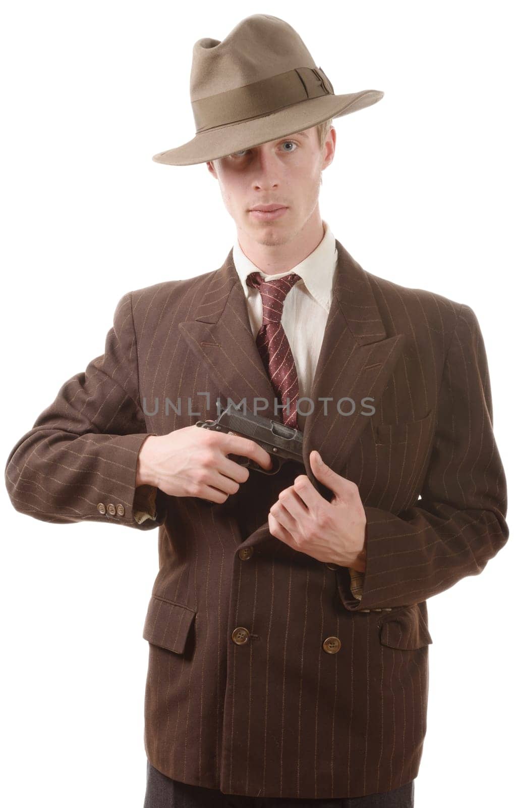 a gangster in a suit vintage, with handgun on white background