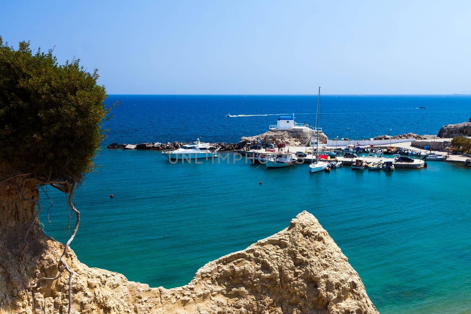 Kolymbia beach with the rocky coast in Greece.