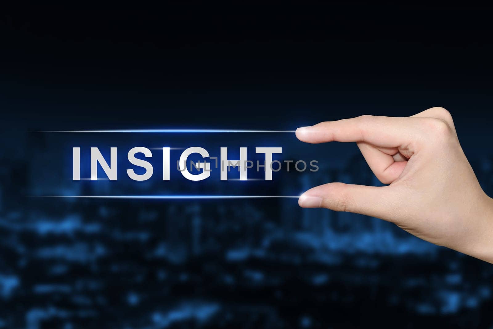 hand pushing insight button on blurred blue background