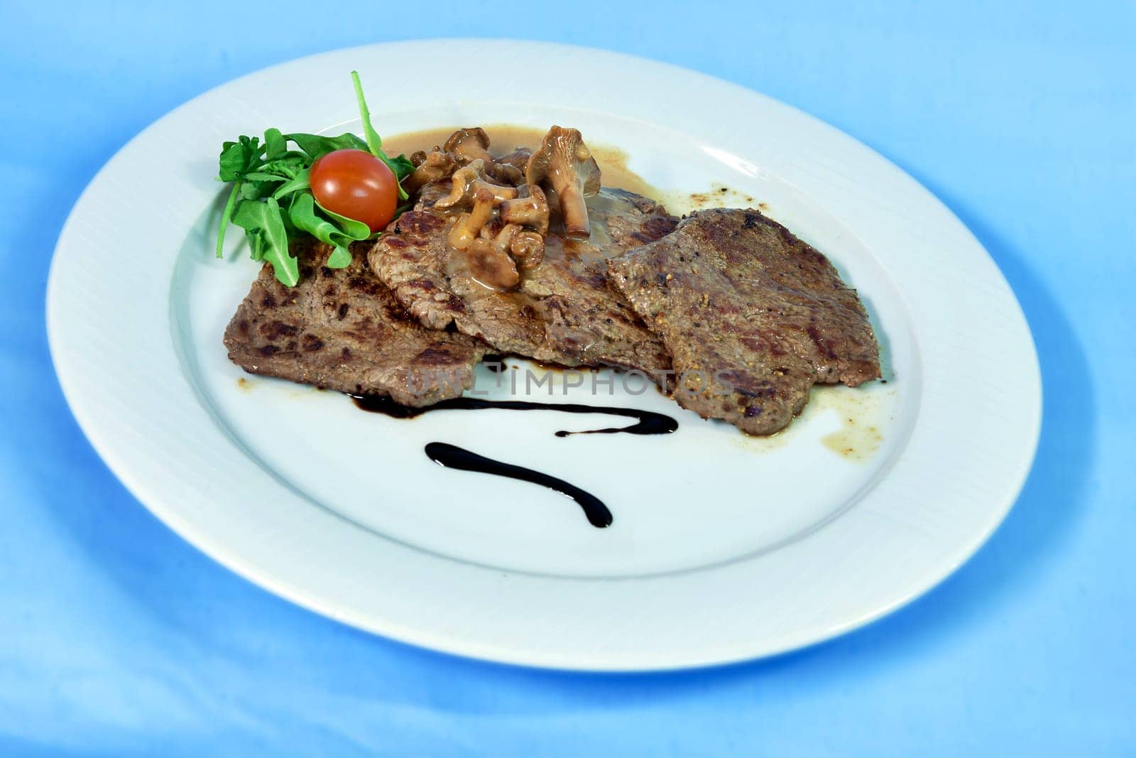 Grilled beef tenderloin with mushrooms and cream sauce