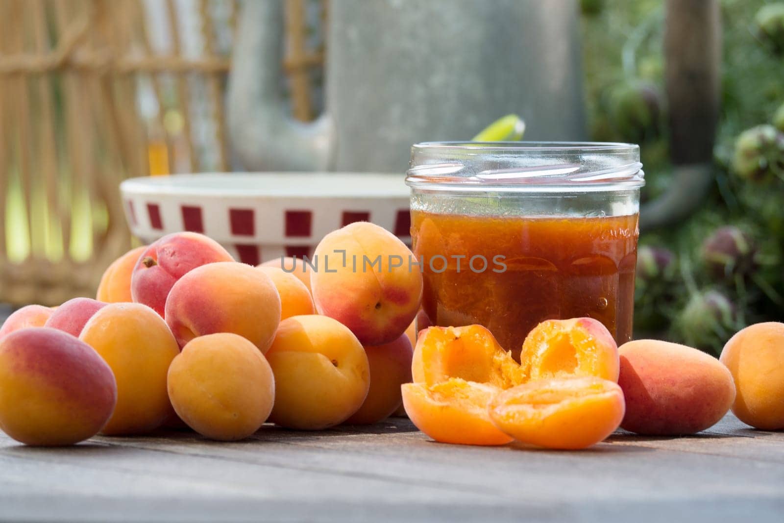 many apricots and pot of jam