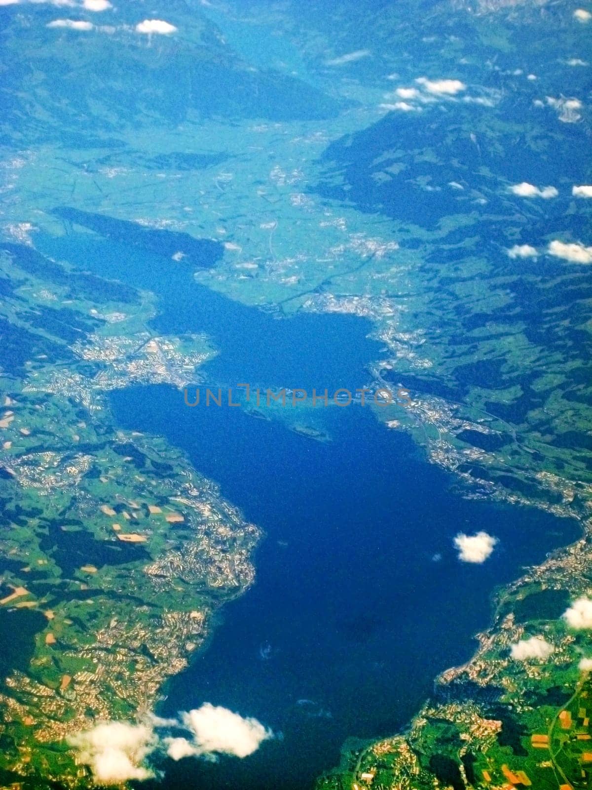 Lake Zurich / Zurichsee - aerial view during flight. View of bridge Seedamm and islands Ufenau Lutzelau