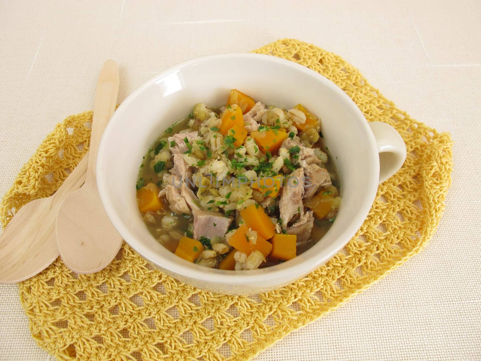 Stew with vegetables,barley and lentils in meat broth