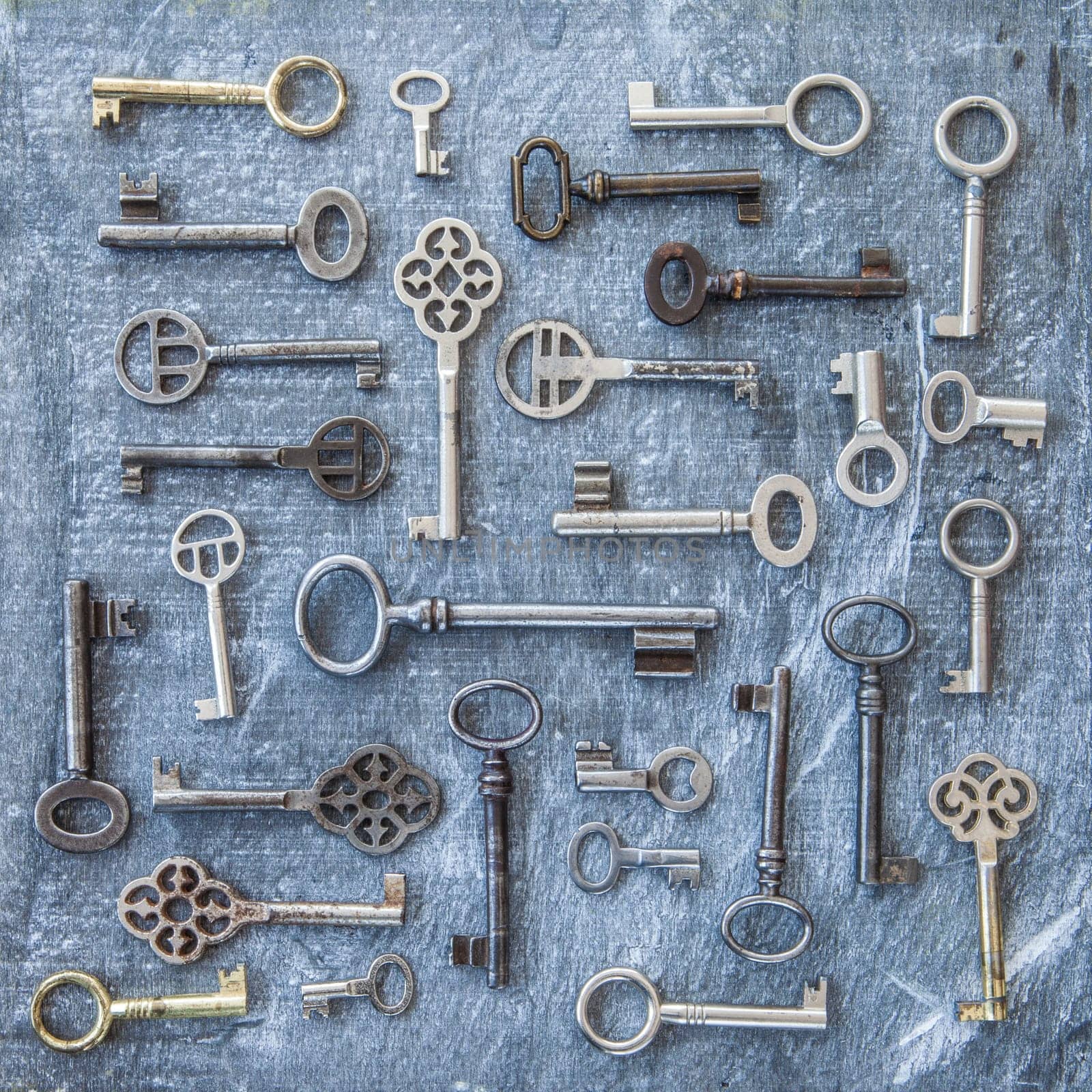 Various key on dark background made of wood
