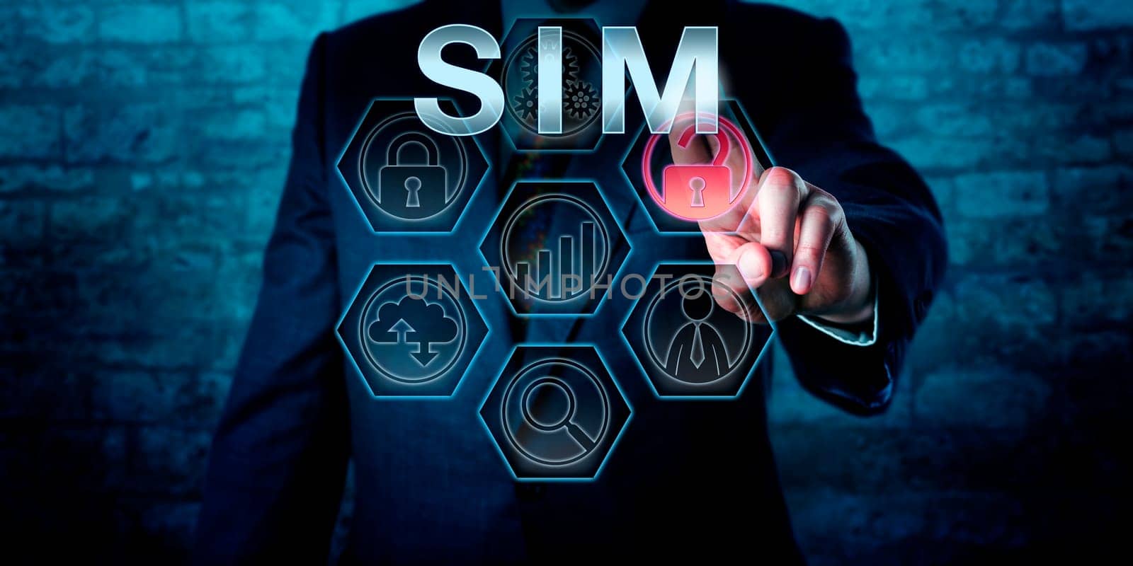 Male cyber security manager is pressing the industry acronym SIM on an interactive touch screen display. Business metaphor and information technology concept for Security information Management.