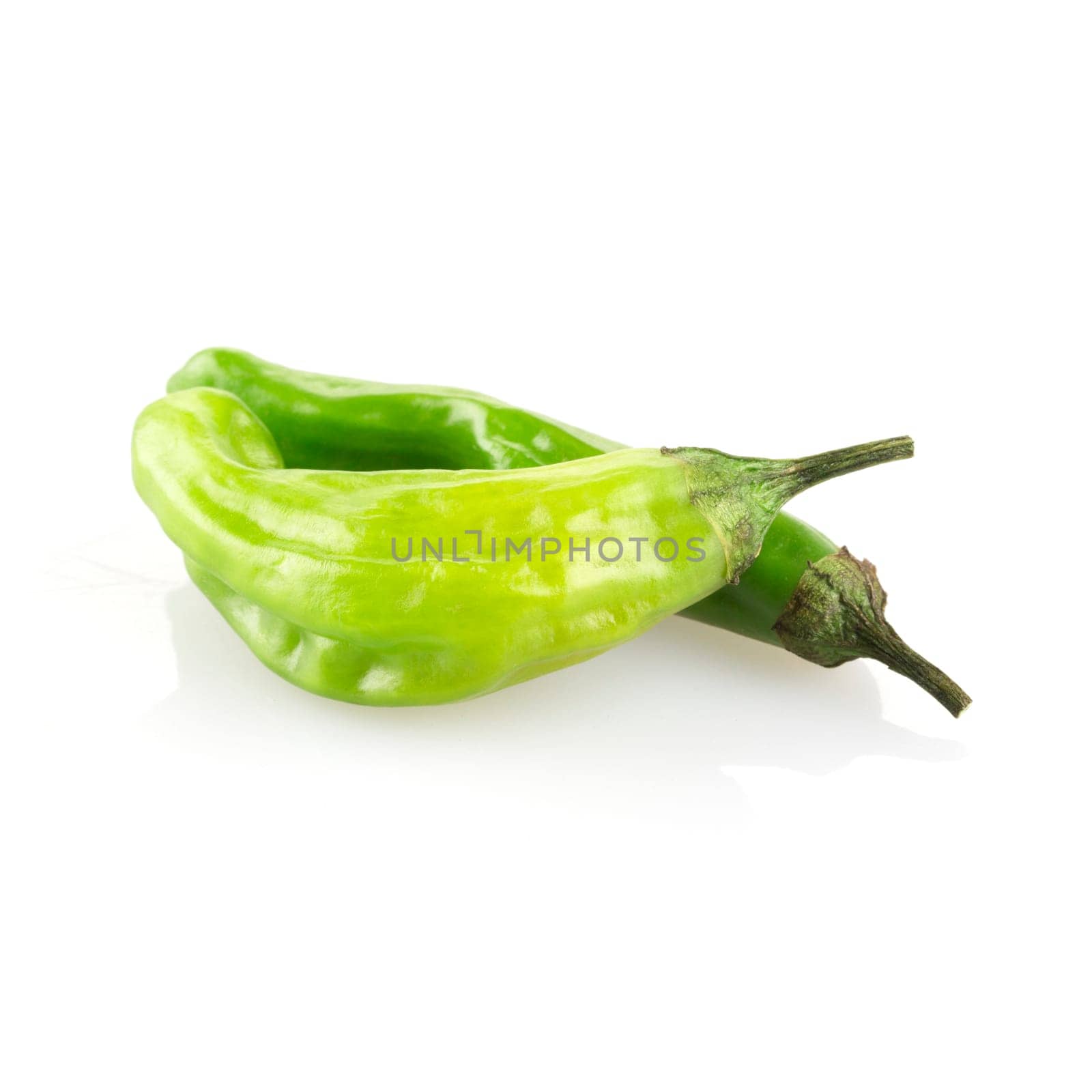 Shishito peppers isolated on a white background with shadow.
