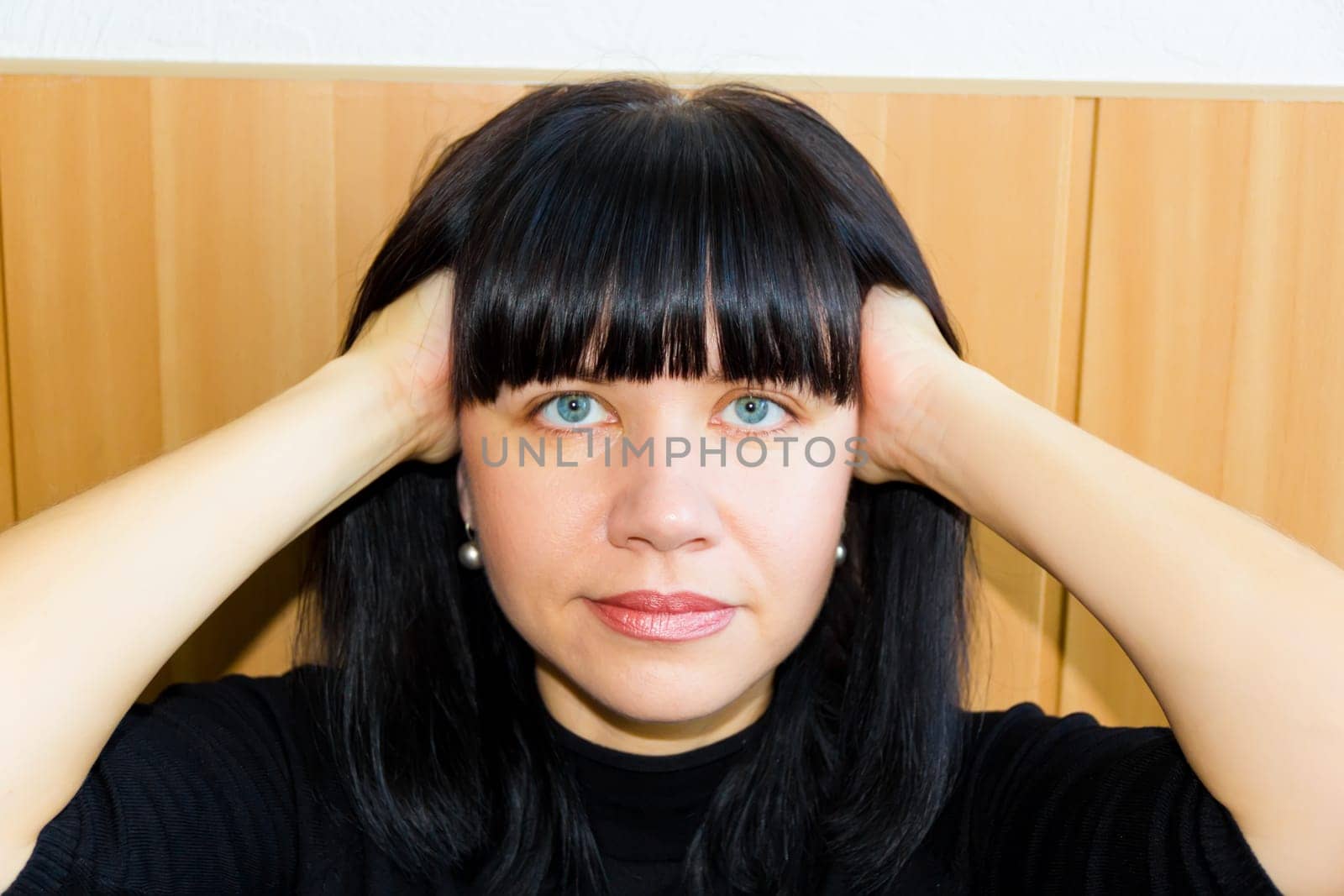 Portrait of European beautiful woman with black hair