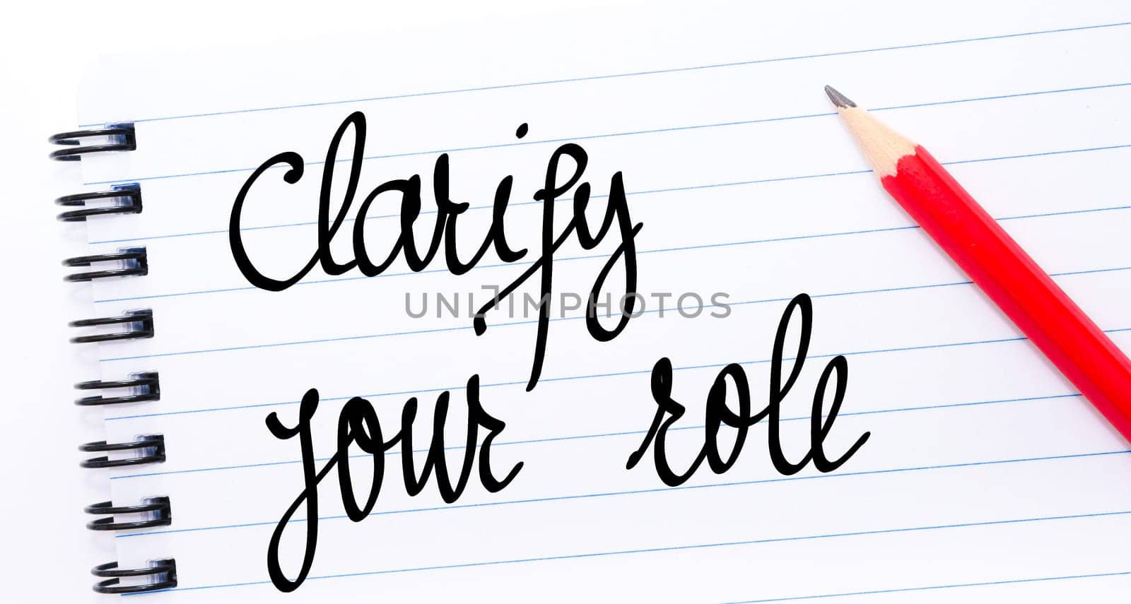 Clarify Your Role written on notebook page with red pencil on the right