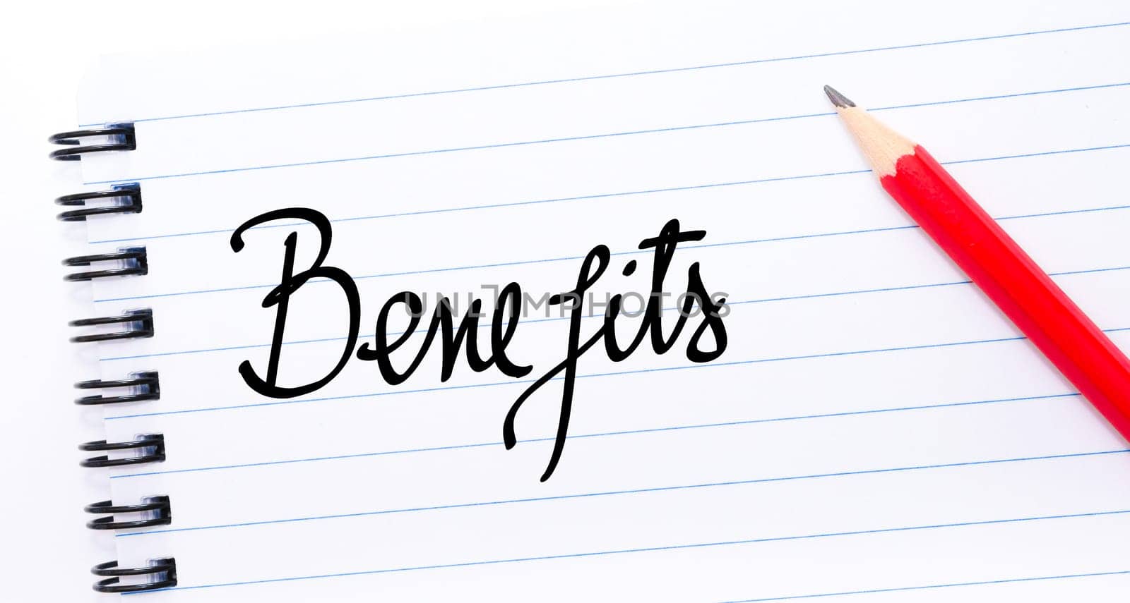 Benefits written on notebook page with red pencil on the right