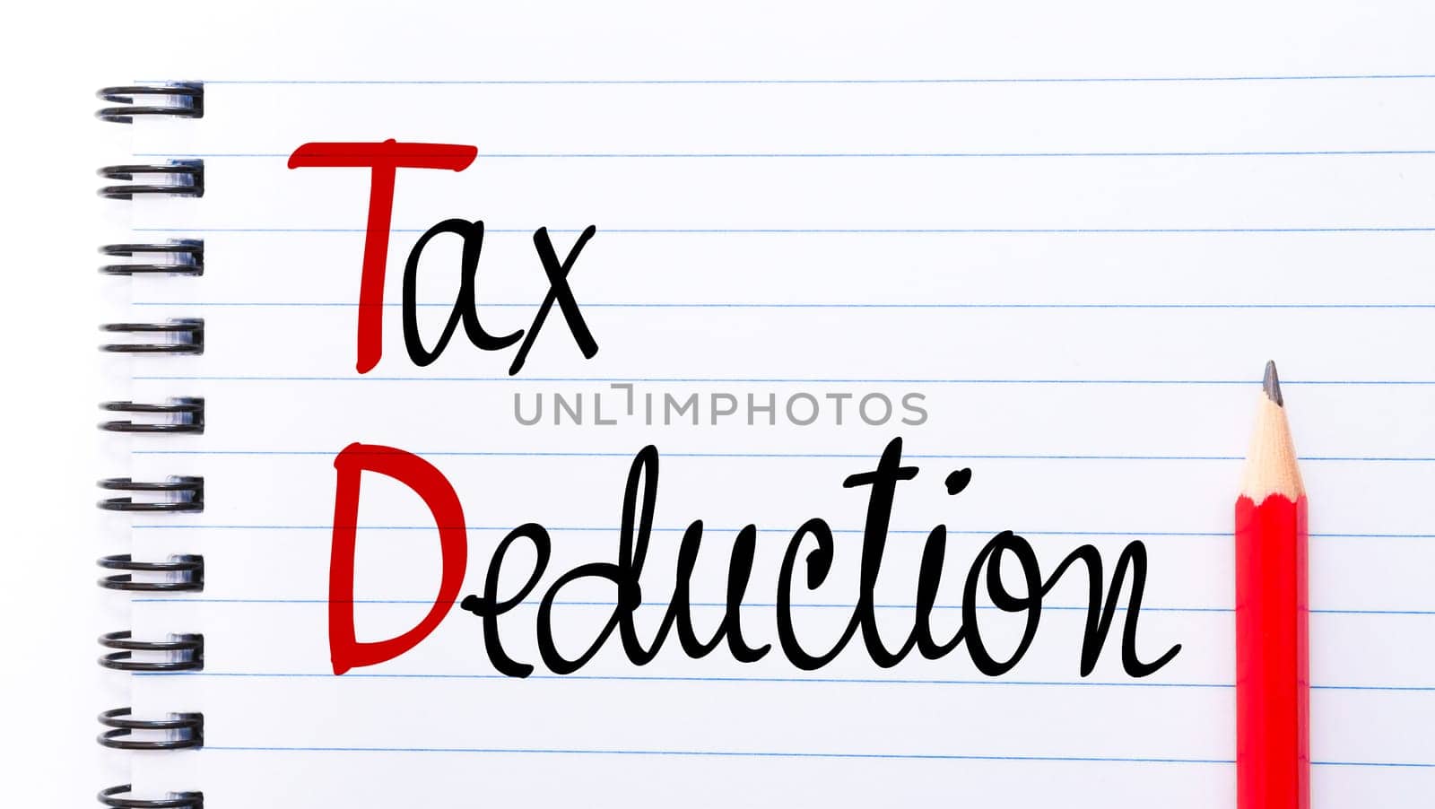 TD Tax Deduction written on notebook page with red pencil on the right