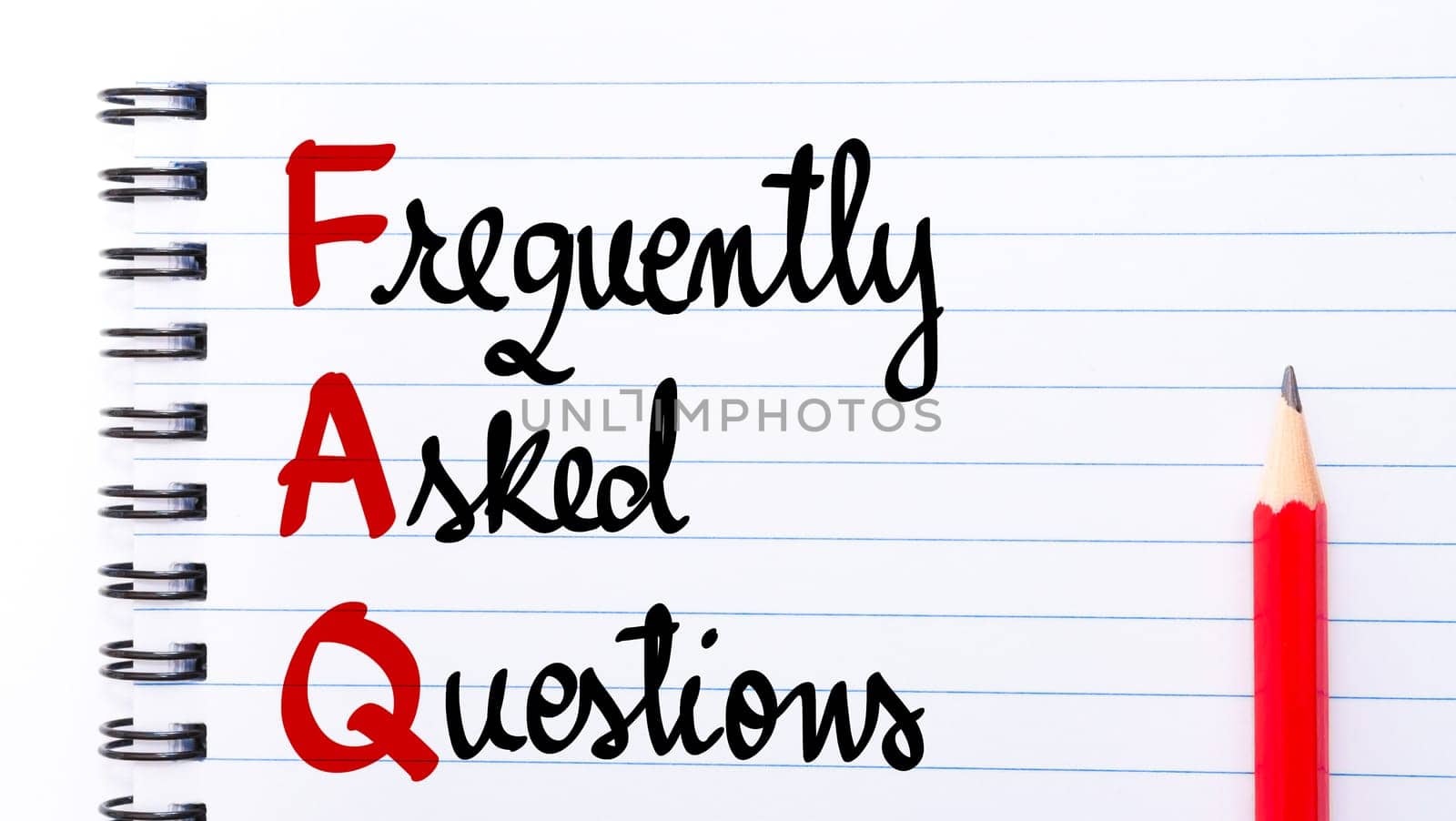 FAQ Frequently Asked Questions written on notebook page with red pencil on the right